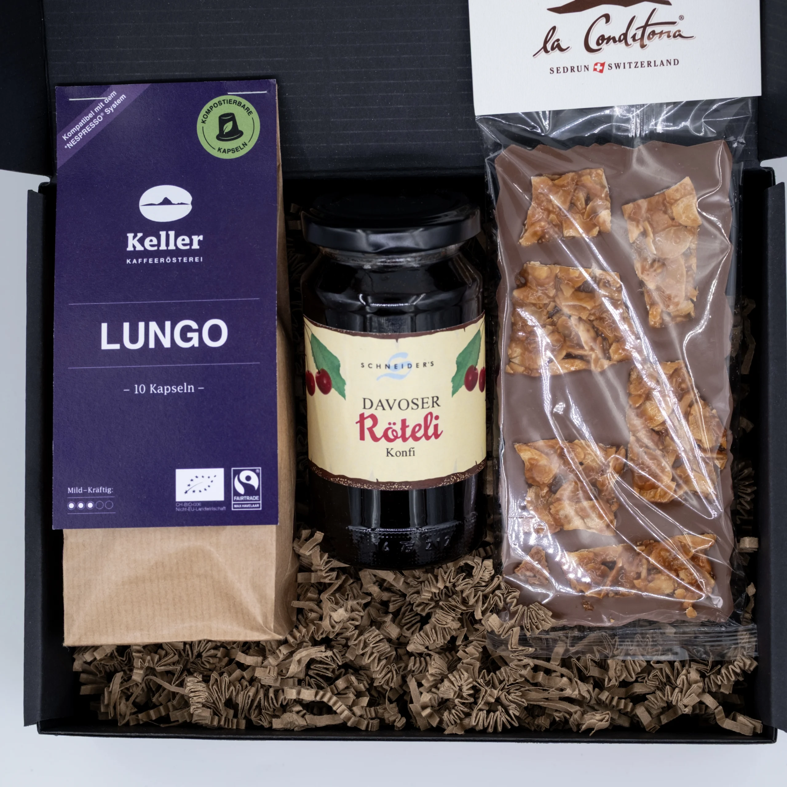 Süsse Geschenkbox mit Schokolade, Konfi und Kaffee.